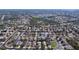 Wide aerial view of a residential neighborhood with various house styles and community layout at 13304 Mandalay Pl, Spring Hill, FL 34609
