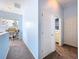 Upstairs hallway with reading nook leads to a bathroom and a bedroom at 13304 Mandalay Pl, Spring Hill, FL 34609