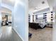Cozy main bedroom with an arched ceiling, complemented by stylish blue-and-white decor at 13304 Mandalay Pl, Spring Hill, FL 34609