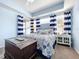 Comfortable main bedroom with a cozy bed, soft lighting, and ample natural light at 13304 Mandalay Pl, Spring Hill, FL 34609