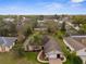 Aerial shot highlighting a house with charming curb appeal, and a lush neighborhood at 1382 Aladdin Rd, Spring Hill, FL 34609
