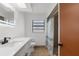 Bathroom with tile flooring, white vanity and shower with a curtain at 1382 Aladdin Rd, Spring Hill, FL 34609