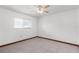 Bedroom with tile flooring, ceiling fan, and one window at 1382 Aladdin Rd, Spring Hill, FL 34609