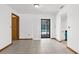 Open room with tile flooring and sliding glass doors overlooking pool, connecting indoor and outdoor living spaces at 1382 Aladdin Rd, Spring Hill, FL 34609