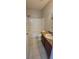 Bathroom featuring vanity with granite counters and tub with shower at 15772 Stable Run Dr, Spring Hill, FL 34610