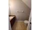 Powder room with granite vanity and tiled floors at 15772 Stable Run Dr, Spring Hill, FL 34610