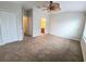 Bedroom featuring neutral walls, carpet flooring, and a ceiling fan at 15772 Stable Run Dr, Spring Hill, FL 34610
