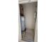 This space features a water heater and electric panel inside of a closet area at 15772 Stable Run Dr, Spring Hill, FL 34610