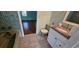 Outdated bathroom features green tile and fixtures with a cultured marble vanity at 17932 Wendy Sue Ave, Hudson, FL 34667
