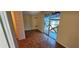 Bright bedroom featuring access to a private balcony and natural light at 17932 Wendy Sue Ave, Hudson, FL 34667