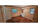 Bedroom with hardwood floors and natural lighting at 17932 Wendy Sue Ave, Hudson, FL 34667