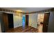 Open view of a bedroom, bathroom and closet, with hardwood floors and great lighting at 17932 Wendy Sue Ave, Hudson, FL 34667