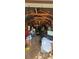 Interior view of a shed, showcasing storage space and wooden beams at 17932 Wendy Sue Ave, Hudson, FL 34667