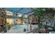 Spacious sun room with a wood floor, clear ceiling, and greenery at 17932 Wendy Sue Ave, Hudson, FL 34667