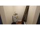 Small utility closet with water heater and shelving at 17932 Wendy Sue Ave, Hudson, FL 34667