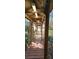 A wooden walkway leads to the home, surrounded by lush greenery at 17932 Wendy Sue Ave, Hudson, FL 34667