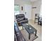 Relaxing space features tile floors, comfortable seating, and neutral wall paint at 20857 Haulover Cv # B15, Lutz, FL 33558