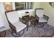 Cozy outdoor patio with seating, ideal for relaxation and enjoying the outdoors at 20857 Haulover Cv # B15, Lutz, FL 33558