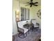 Charming outdoor patio with comfortable seating and decorative elements at 20857 Haulover Cv # B15, Lutz, FL 33558
