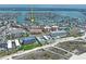 Expansive aerial view of a waterfront property with convenient access to the beach and nearby urban amenities at 291 115Th Ave, Treasure Island, FL 33706
