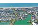 Beautiful aerial view highlighting this waterfront home's ideal location near pristine beaches and boating facilities at 291 115Th Ave, Treasure Island, FL 33706