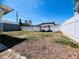 The large, fenced yard includes a detached garage, offering privacy and extra space at 3243 Bayport Dr, Holiday, FL 34691