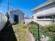 Backyard area with a shed and lush landscaping creates a private outdoor retreat at 3243 Bayport Dr, Holiday, FL 34691