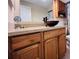 Bathroom with vanity, basin sink and large mirror at 3243 Bayport Dr, Holiday, FL 34691