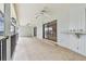 Enjoy the outdoors on this expansive covered patio with great views at 3255 Meadow View Ln, Palm Harbor, FL 34683