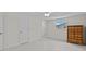 Bright bedroom featuring wood look floors, neutral walls, and standard closet doors at 3328 Gulfview Dr, Hernando Beach, FL 34607