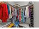 Walk-in closet with ample storage space, shelving, and clothing racks to neatly store belongings and accessories at 3328 Gulfview Dr, Hernando Beach, FL 34607