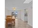 Charming dining area with a view of the backyard and tile flooring at 3328 Gulfview Dr, Hernando Beach, FL 34607