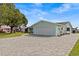 Charming single-story home with a well-manicured lawn, a paver driveway, and an attached two-car garage at 3328 Gulfview Dr, Hernando Beach, FL 34607
