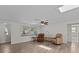 Cozy living room featuring neutral walls, tile floors, and comfortable seating at 3328 Gulfview Dr, Hernando Beach, FL 34607