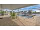 Screened in pool with outdoor seating overlooking the water, perfect for outdoor living at 3328 Gulfview Dr, Hernando Beach, FL 34607