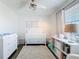 Bedroom featuring a crib, changing table, and built in shelving at 3344 Gardenia Dr, Hernando Beach, FL 34607