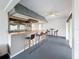 Bonus room featuring a bar with seating, perfect for entertaining guests at 3344 Gardenia Dr, Hernando Beach, FL 34607