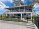 Beautiful waterfront home with spacious screened porches and lush, landscaped backyard at 3344 Gardenia Dr, Hernando Beach, FL 34607