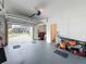 Spacious garage with an open door, offering convenient parking and storage solutions at 3344 Gardenia Dr, Hernando Beach, FL 34607