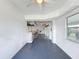 Relaxing bonus room featuring a ceiling fan and space for entertainment or recreation at 3344 Gardenia Dr, Hernando Beach, FL 34607