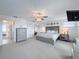 Spacious main bedroom with a ceiling fan, ensuite bathroom, and neutral décor at 3344 Gardenia Dr, Hernando Beach, FL 34607