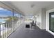 Enjoy waterfront views from the screened porch with plenty of space for outdoor seating at 3344 Gardenia Dr, Hernando Beach, FL 34607