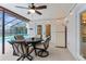 Outdoor patio with a ceiling fan, lights, outdoor furniture, and a refrigerator at 4144 Glade Rd, Spring Hill, FL 34606