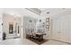 The formal dining area features tile floors, plantation shutters, and double doors to the lanai at 5383 Firethorn Pt, Spring Hill, FL 34609