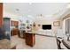 The living room and kitchen area offer an open floorplan with natural light and ample space at 5383 Firethorn Pt, Spring Hill, FL 34609