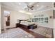 A spacious main bedroom offers tray ceilings and generous natural light at 5383 Firethorn Pt, Spring Hill, FL 34609