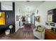 Stylish dining room with modern lighting, eclectic decor, and a view of the living room at 5801 65Th N Ter, Pinellas Park, FL 33781