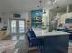 Charming kitchen featuring a large island, blue cabinets, and lots of counter space at 5801 65Th N Ter, Pinellas Park, FL 33781