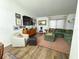 Cozy living room with comfortable seating, stylish decor, and a warm ambiance at 5801 65Th N Ter, Pinellas Park, FL 33781