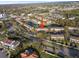 Aerial view of the townhome community with pond at 6027 Bayside Key Dr, Tampa, FL 33615